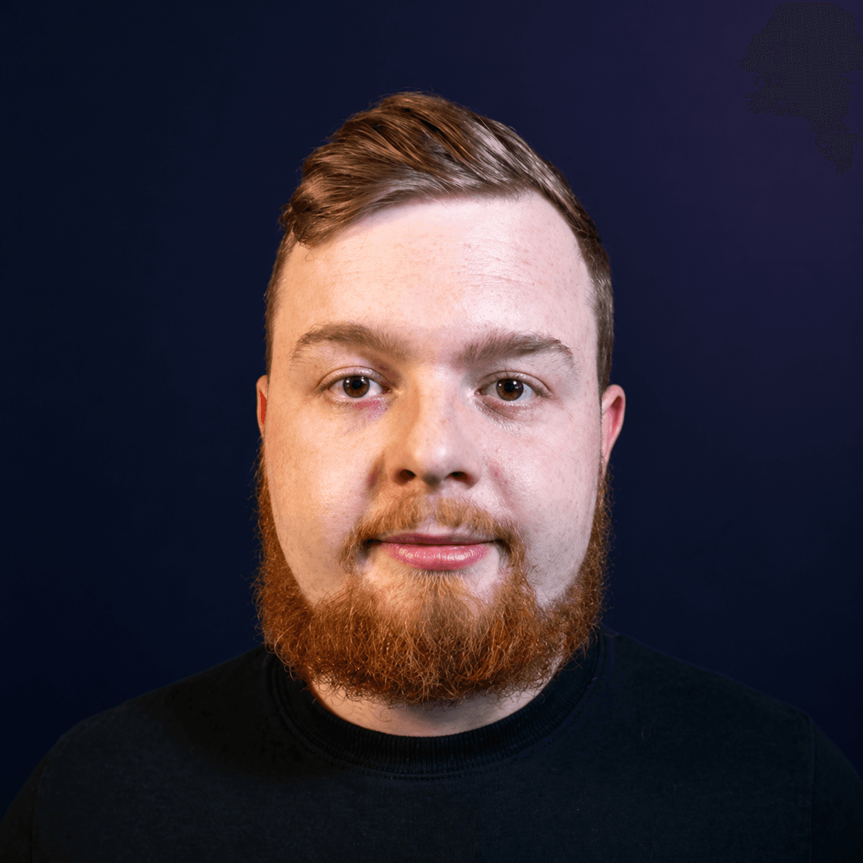 Connor Dinnadge against a navy background